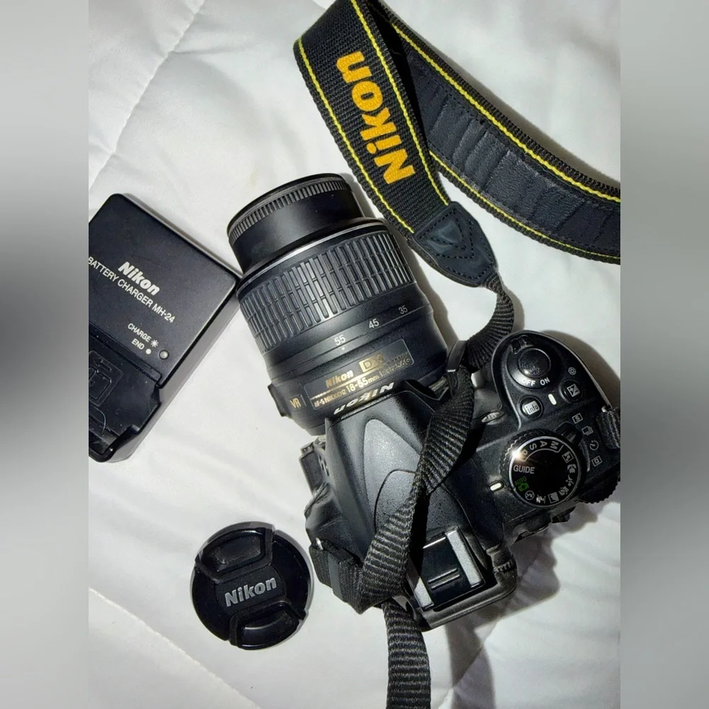 Nikon D3100 DSLR Camera with 18-55mm f/3.5-5.6 Auto Focus-S Nikkor Zoom Lens